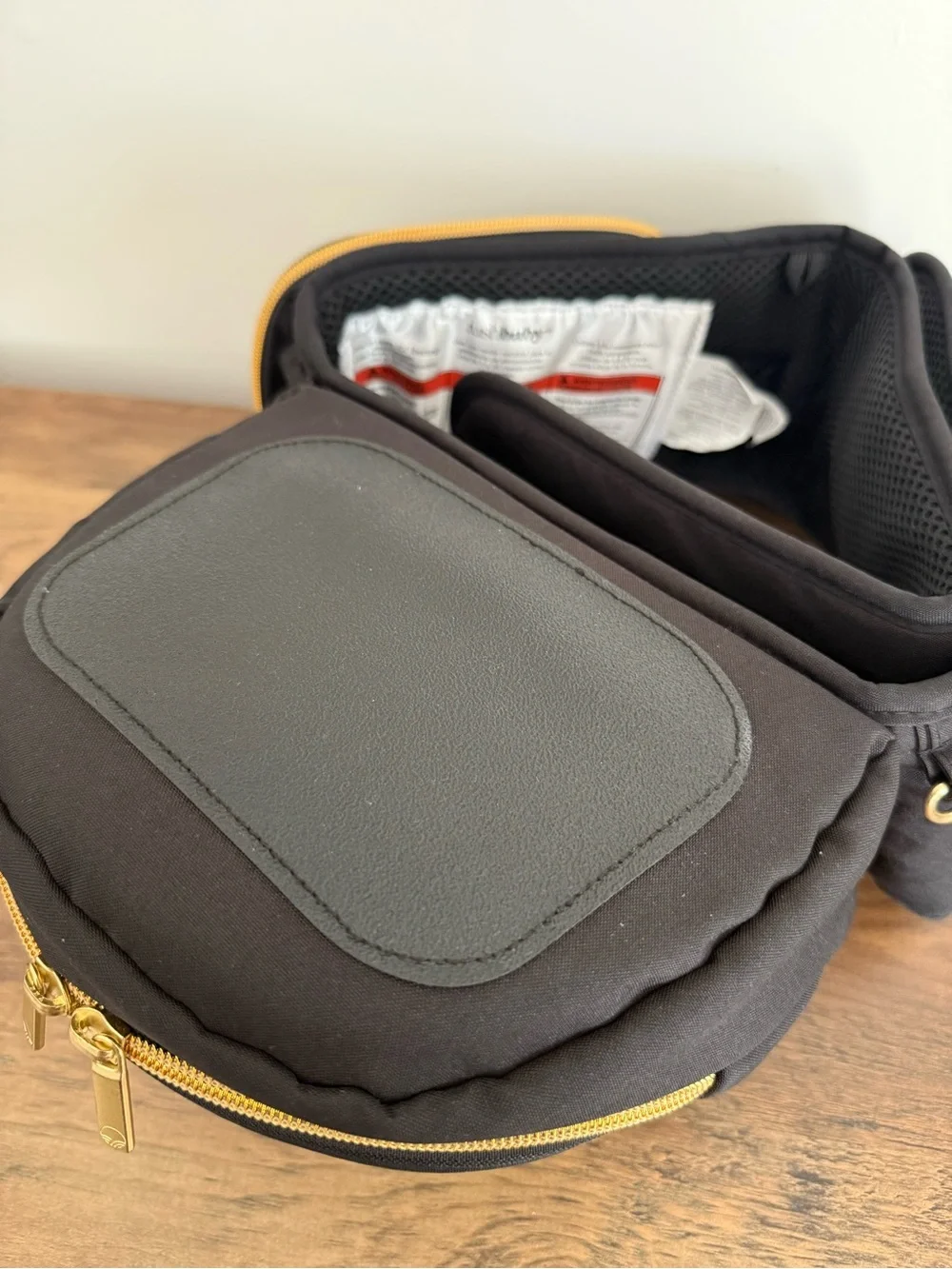 TUSHBABY Black Baby Bag Backpack - Compact Diaper Waist Bag